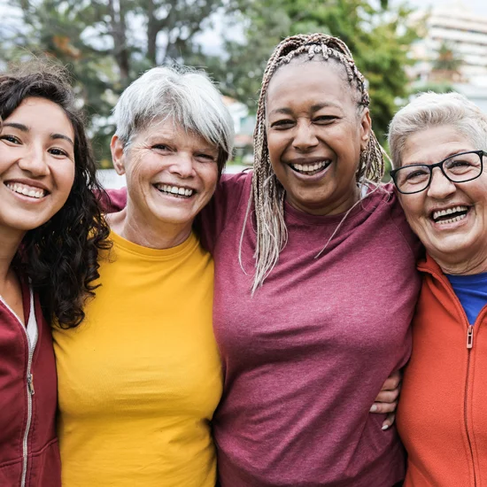 Social Impact Ladies sharing a happy moment