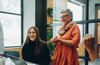 Coworkers enjoying a moment Coworkers enjoying a moment