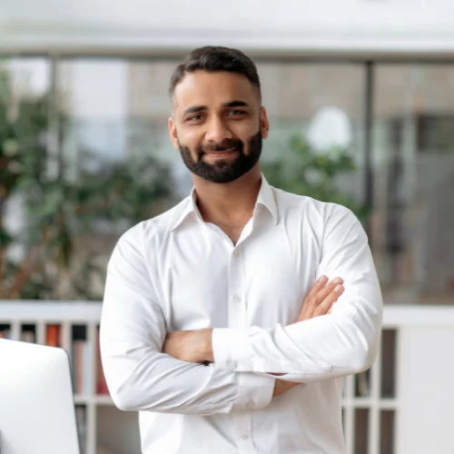 Man posing with arms crossed