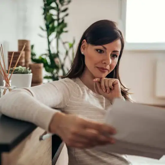 woman reviewing insurance documents