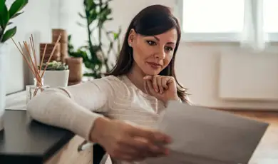woman reviewing insurance documents