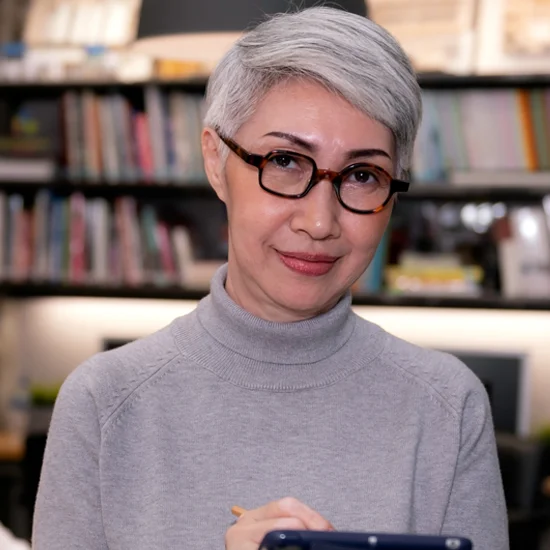woman holding tablet
