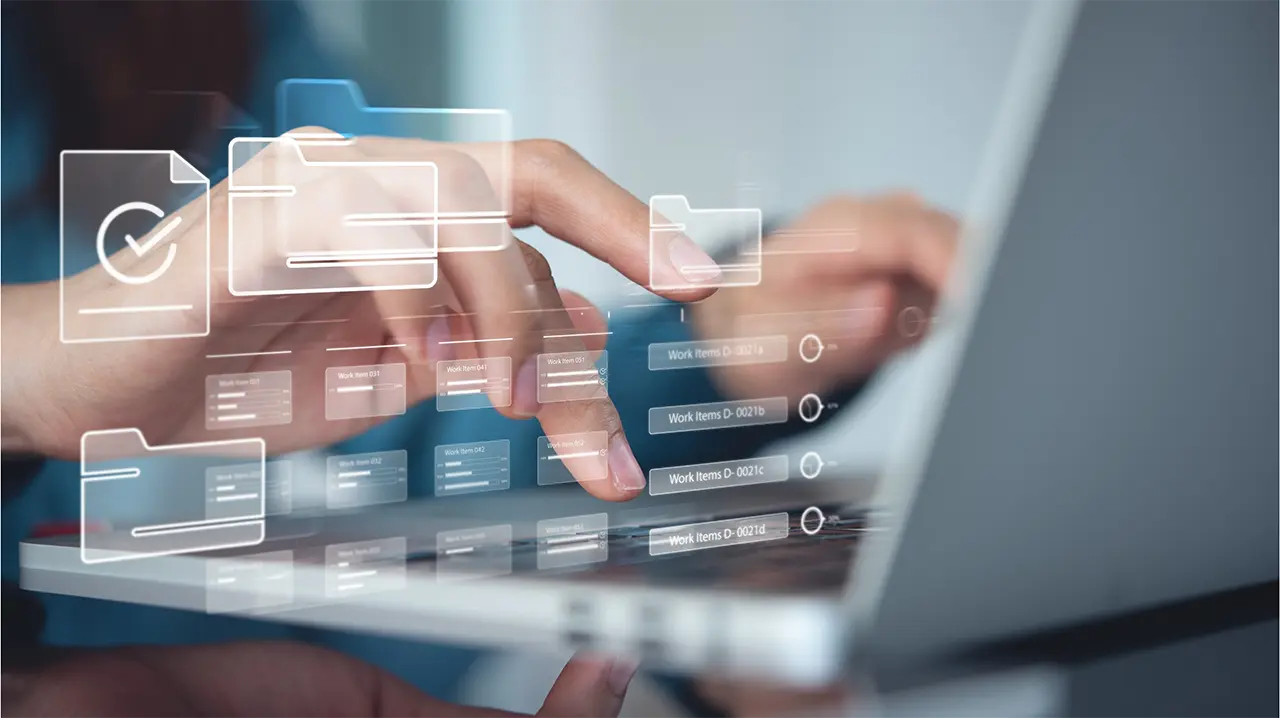 Diverse Document Processing with Policy Data Extract AI Reviewing documents on a laptop