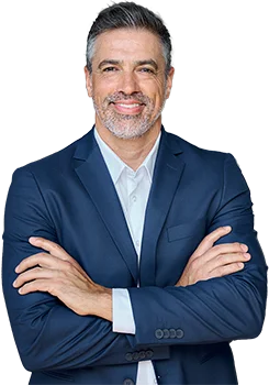 Contact Patra Now Businessman smiling arms crossed