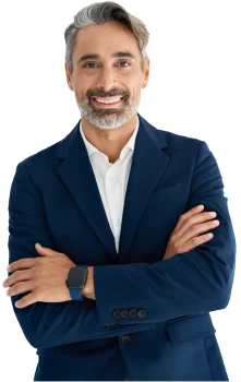 Contact Patra! contact image man standing arms crossed smiling navy blue jacket