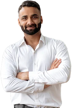Contact Patra Now Young businessman smiling arms crossed
