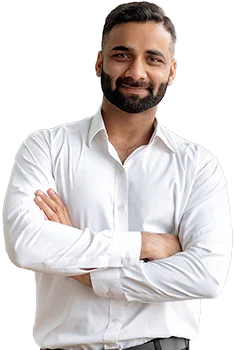 Contact Patra Now Young businessman smiling arms crossed