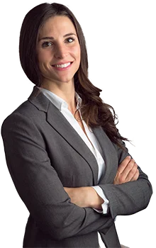Contact Patra Now Young businesswoman smiling arms crossed